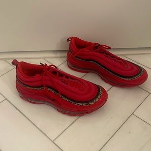 Red nike sneakers with leopard print. Worn once. Size 8 women.